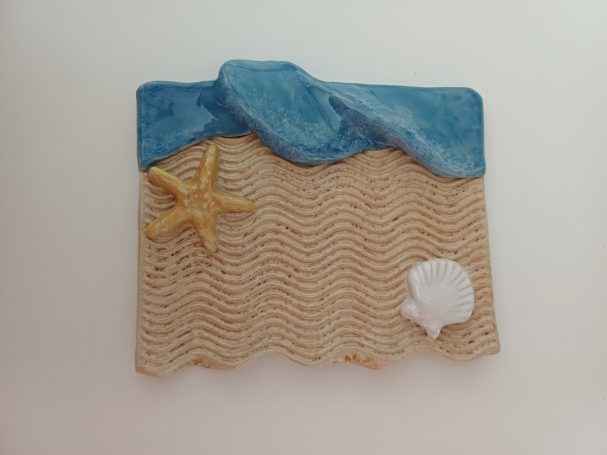 decoratief zeepschaaltje met strand, zee, schelp en zeester