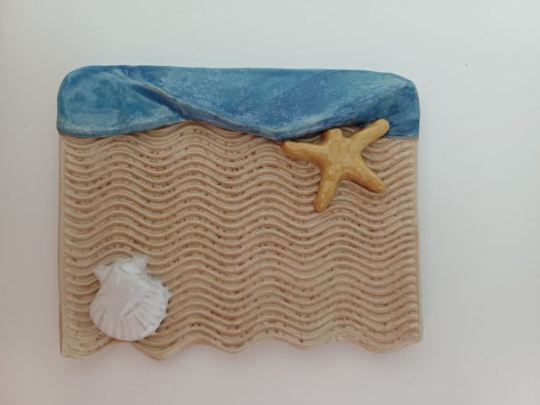 decoratief zeepschaaltje met strand, zee, schelp en zeester